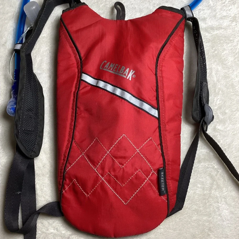 CamelBak Skeeter Hydration Pack New Bladder Red Black Hiking Cycling Backpack